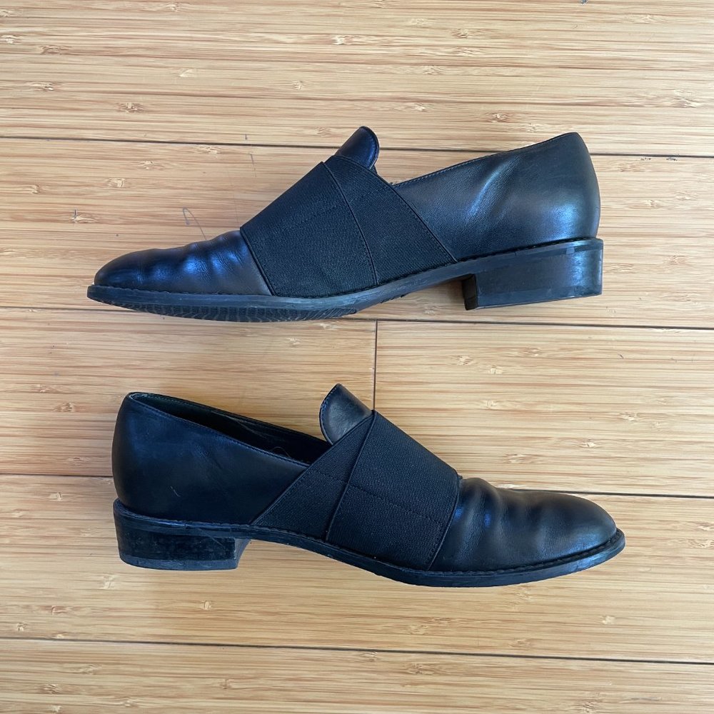 Stuart Weitzman Black Criss-Cross Loafer